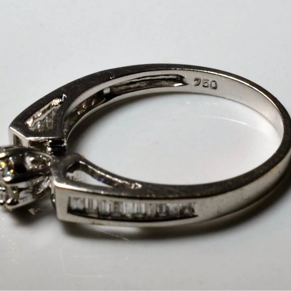 Baguette Diamond Cluster Engagement Ring

0.36ctw | SZ 6.75 - Picture 3 of 4